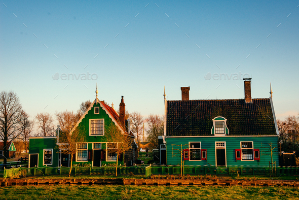 Comfortable houses at sunset. - Stock Photo - Images