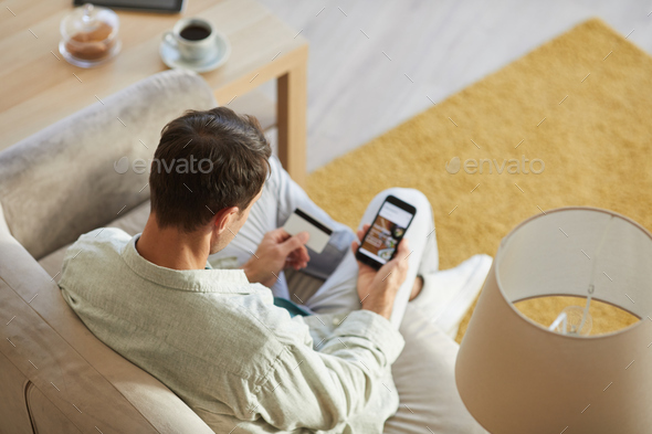 Using mobile phone for online shopping - Stock Photo - Images