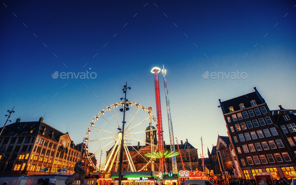 amusement park carousel. Beautiful night lighting. A fairy tale for children - Stock Photo - Images