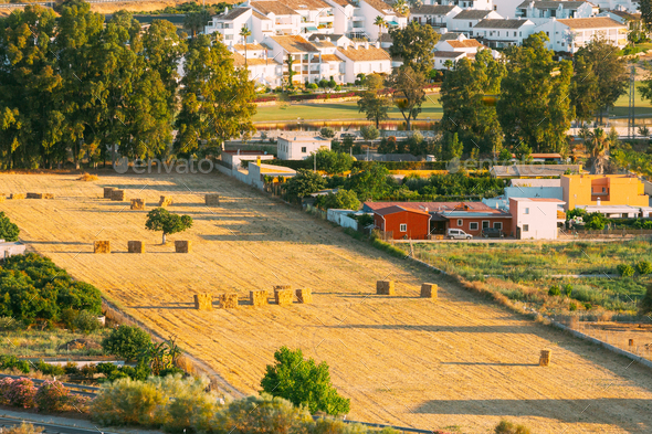 Andalusia region, Spain. Elevated View Of Rural Landscape Field With Hay Bales Rolls - Stock Photo - Images