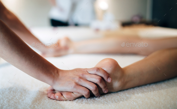 Foot and sole massage in therapeutic relax treatment
