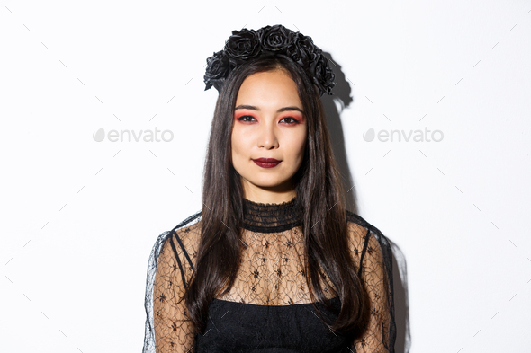 Close Up Of Beautiful Gothic Girl With Black Wreath Getting Dressed For Halloween Party Standing Stock Photo By Benzoix