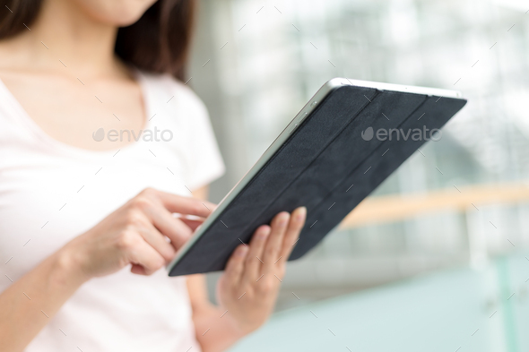 Woman use of digital tablet pc - Stock Photo - Images
