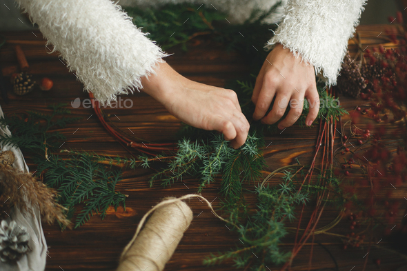 Making rustic christmas wreath, holiday advent. - Stock Photo - Images