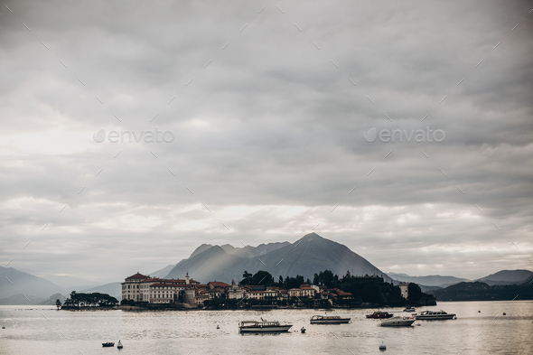 Beautiful view on Borromean Islands  and boats on lake from Stresa - Stock Photo - Images