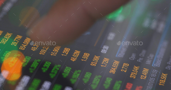 Investing stock market data on the screen - Stock Photo - Images