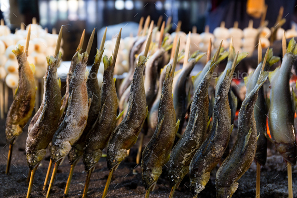 Grilled fish on a stick Stock Photo by leungchopan | PhotoDune