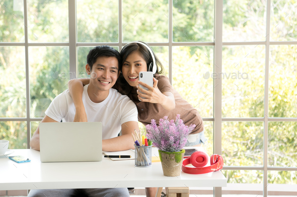 Couple take selfie at home - Stock Photo - Images