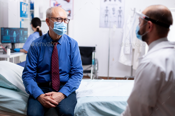 Sick patient talking with doctor - Stock Photo - Images