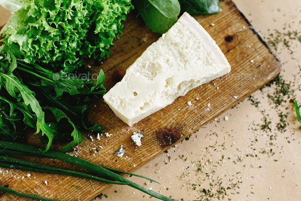 delicious fresh salad arugula spinach and parmezan and gorgonzola cheese - Stock Photo - Images