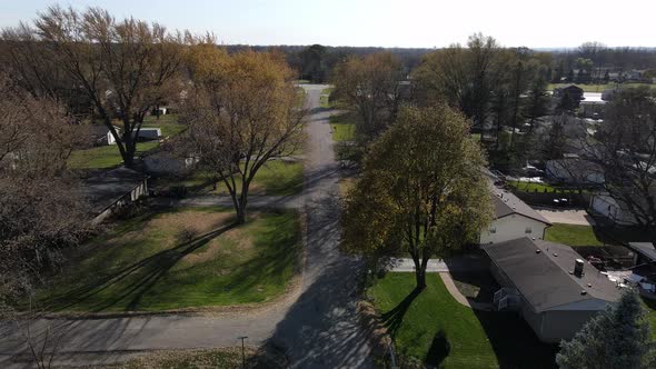 aerial view over a nice neighborhood in mchenry illinois on a sunny afternoon alt