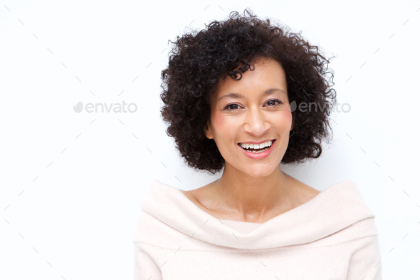 Close up attractive middle age african american woman smiling against white background - Stock Photo - Images