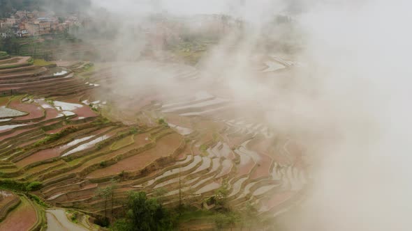 Aerial of the rice fields and villages of Yuanyang County China alt