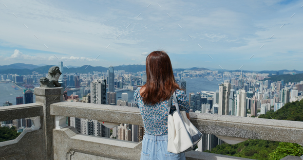 Woman travel in Hong Kong city - Stock Photo - Images