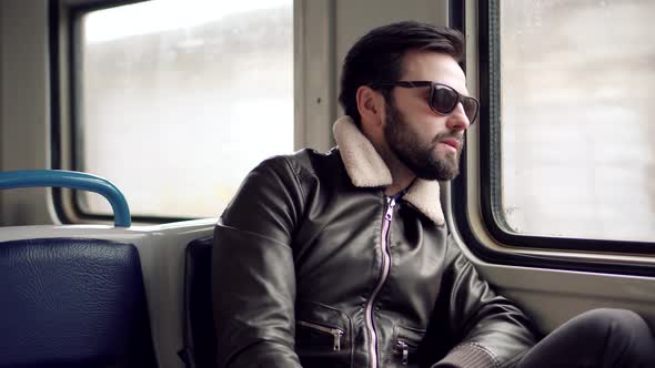 Man Under Stress Work After Fired Job On Tram.  Man Having Exhausting Day In Office After Bad News. alt