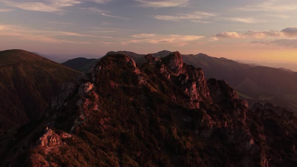 Cinematic Aerial Video of the Golden Hour on Top of a Mountain in a National Park at Sunset