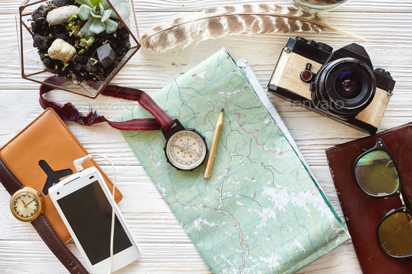 compass, chessboard, hat, passport, banknote money, camera, map