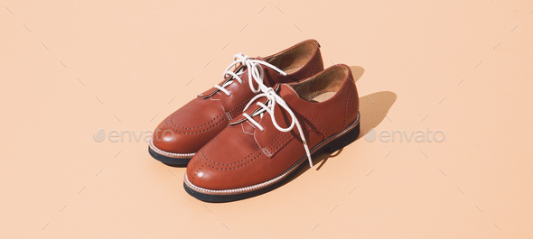 Vintage stylish shoes in isometric on beige background. Minimal fashion retro concept - Stock Photo - Images
