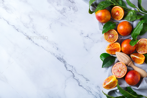 Sweet sicilian blood oranges on a marble table - Stock Photo - Images