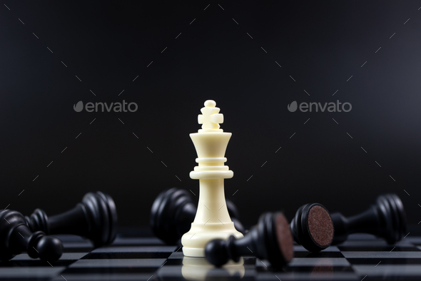 Last standing white king chess piece for business winning concept - Stock Photo - Images
