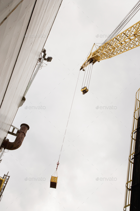 Industrial Crane view from below, moving cargo