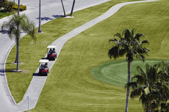 Carts on a Golf Course - Stock Photo - Images