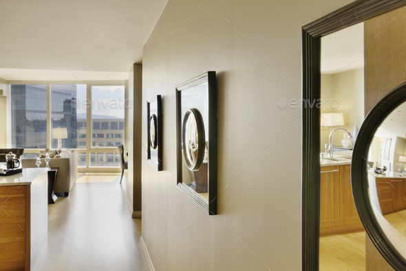 Framed Mirrors on Wall of Upscale Home Interior
