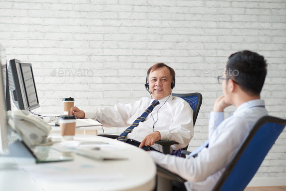 Talking coworkers - Stock Photo - Images