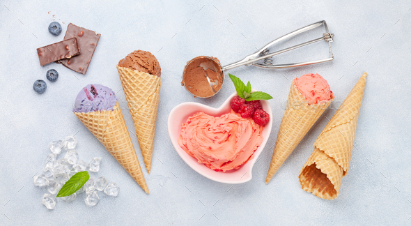 Berry ice cream, waffle cones and fresh berries - Stock Photo - Images