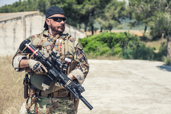Portrait of equipped, armed US Navy SEALs fighter - Stock Photo - Images