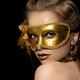 Young beautiful woman wearing golden party mask - PhotoDune Item for Sale