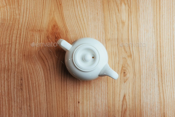 White tea on a wooden table. Advertising photography.