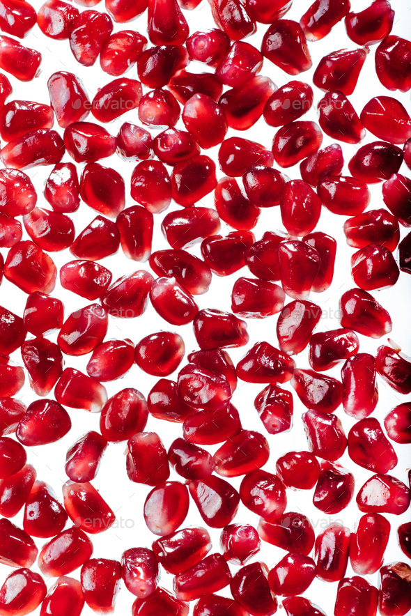 Ripe, delicious, juicy red pomegranate seeds.