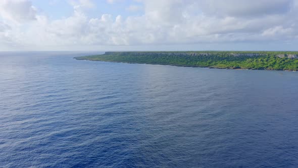 Panoramic drone view of Cotubanama National Park from over the Caribbean alt