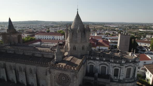 Aerial parallax over Evora Cathedral City buildings as Background, Alentejo