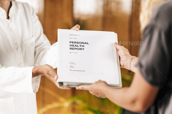 Functional Medicine Practitioner Giving Personal Health Report to the Patient