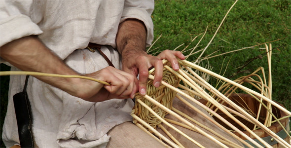 Man Constructing A Wicker Basket