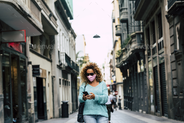 Woman check app and smartphone during corona virus