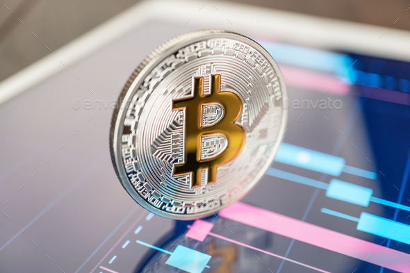 Bitcoin Cryptocurrency On The Tablet - Stock Photo - Images