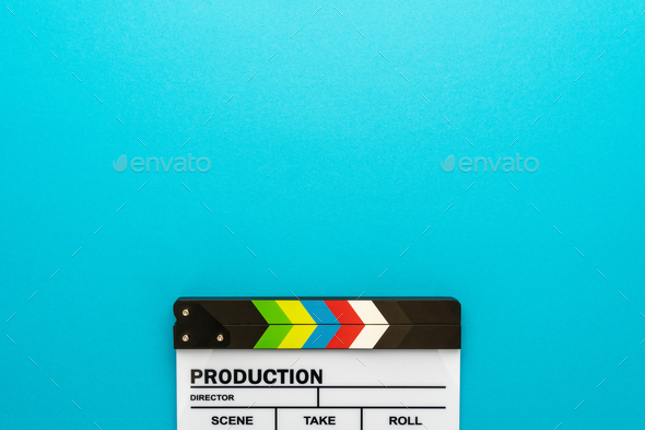 Top View Of Clapperboard At Bottom Of Turquoise Blue Background With Copy Space - Stock Photo - Images