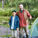 Portrait of Father and Son at Fishing Trip Stock Photo by