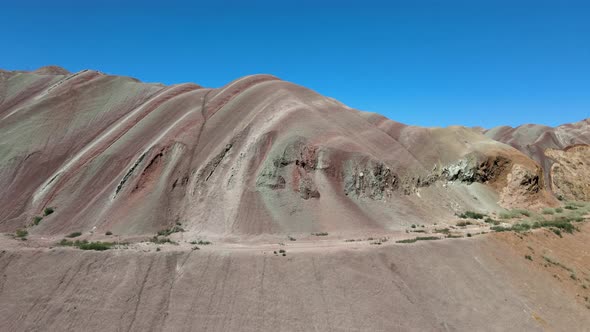 flying drone extreme rainbow colorful hills alt