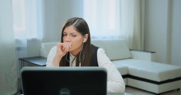 Student Looks Into Display Listening To Online Lecture alt