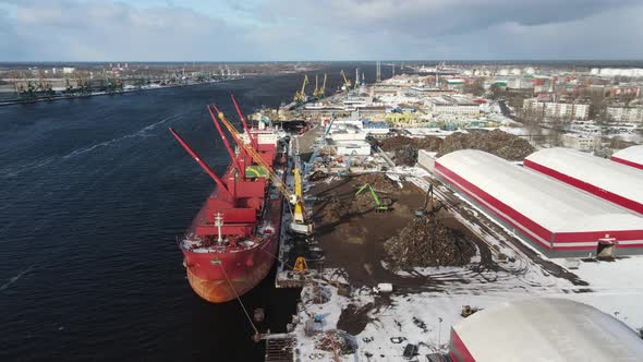 Cargo ship in port alt