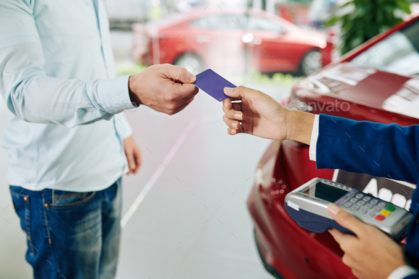 Paying for rental car - Stock Photo - Images