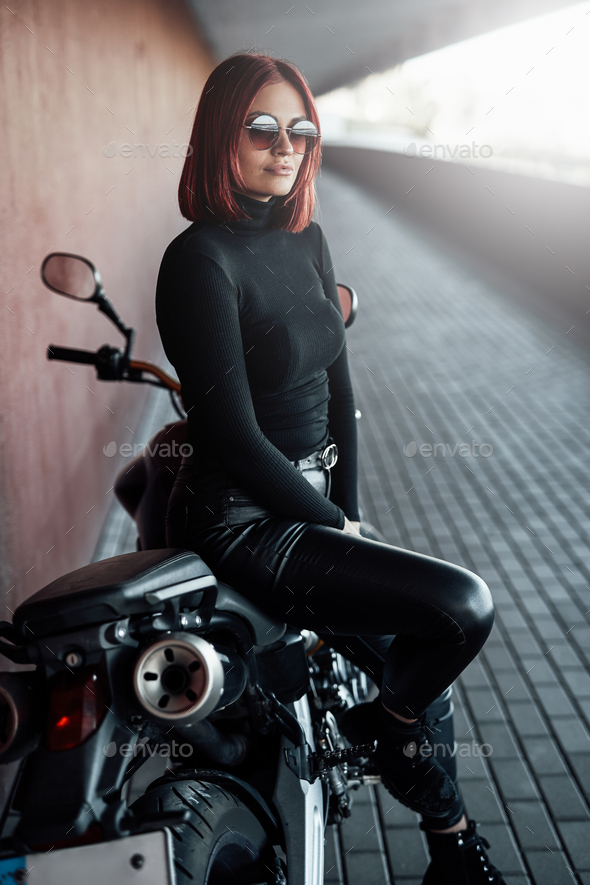 Sexual Biker Woman with Her Motorcycle Stock Image - Image of