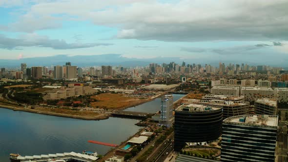 Manila City with Skyscrapers, Philippines Aerial View alt