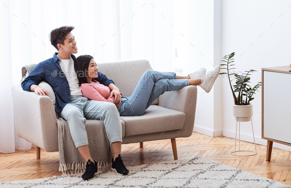 Asian couple in the living room