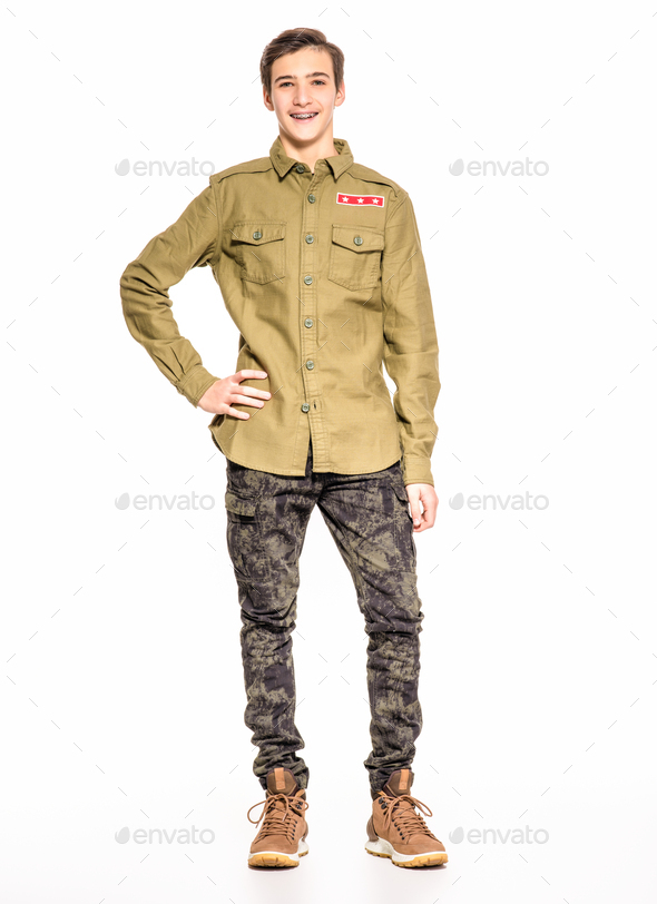 Smiling young man in camouflage clothing. Happy  Conscript in camouflage, - Stock Photo - Images