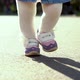 Toddler Girl Feet Stepping on Pathway in Sunny Park - VideoHive Item for Sale